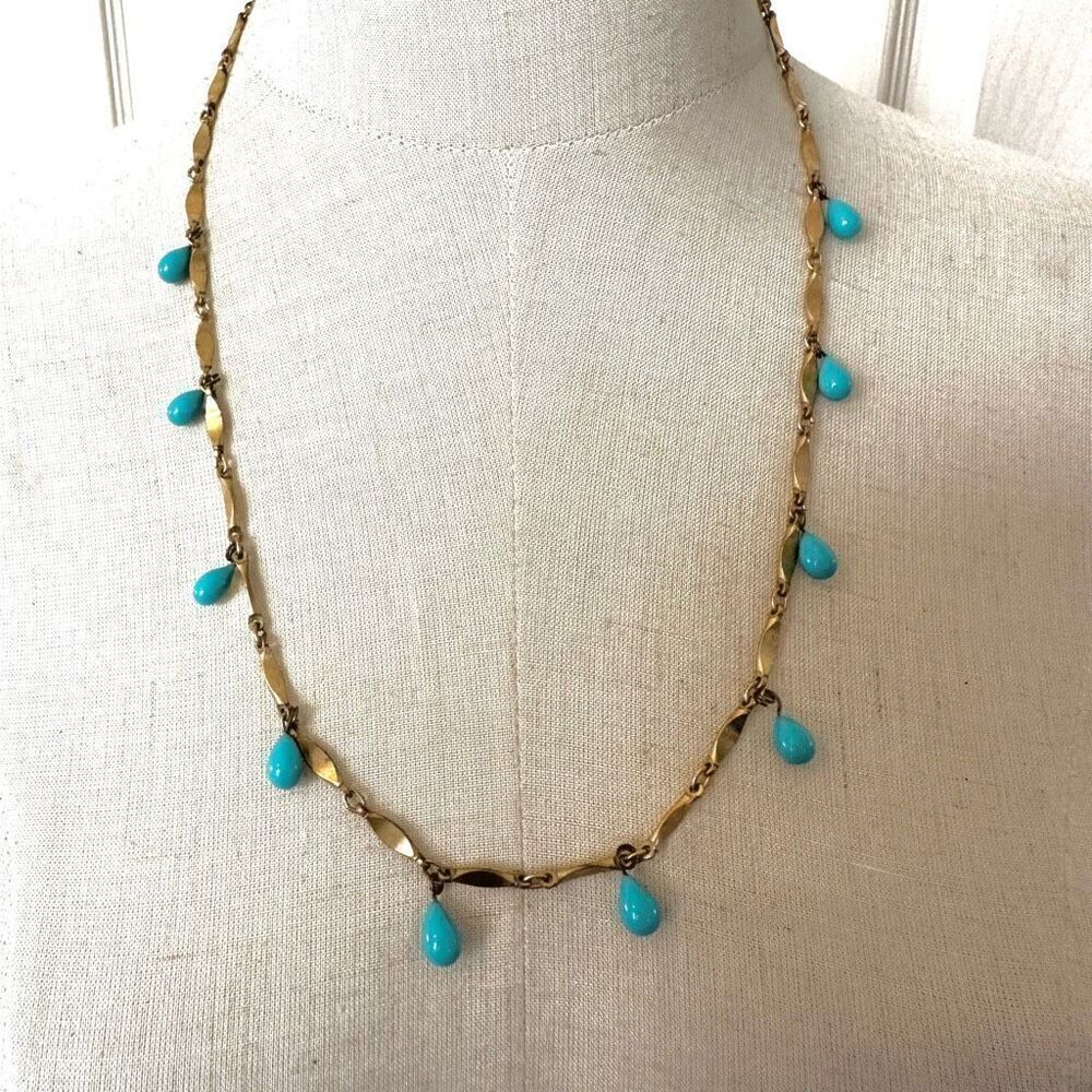 Gold tone and blue teardrop beaded necklace